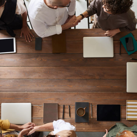 Canva - Top View Photo of People Handshaking